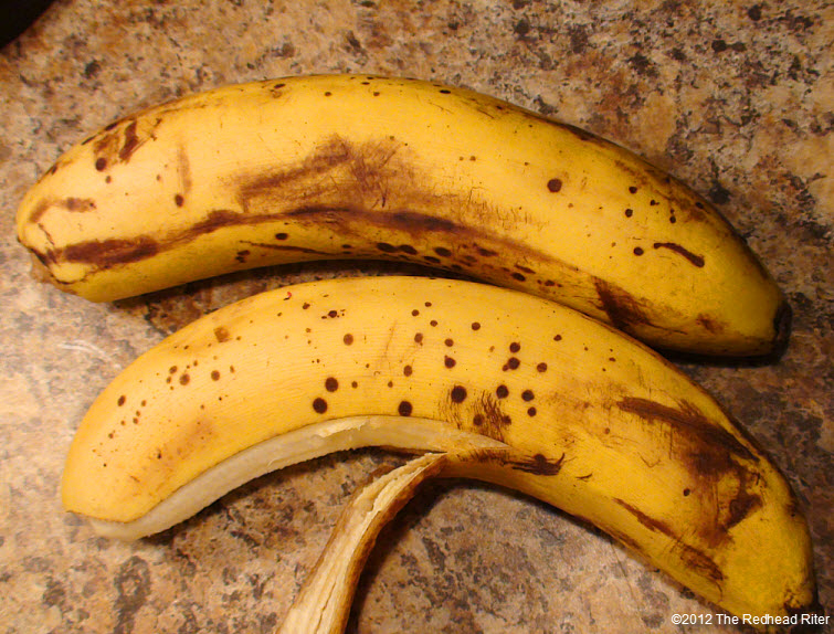 two yellow ripe spotted bananas 1
