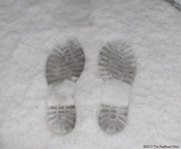 redhead riters footprints in the snow