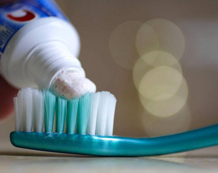 toothpaste on toothbrush crest