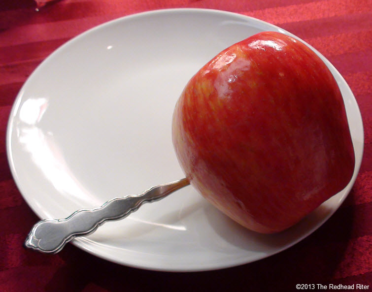 white plate red apple spoon diet