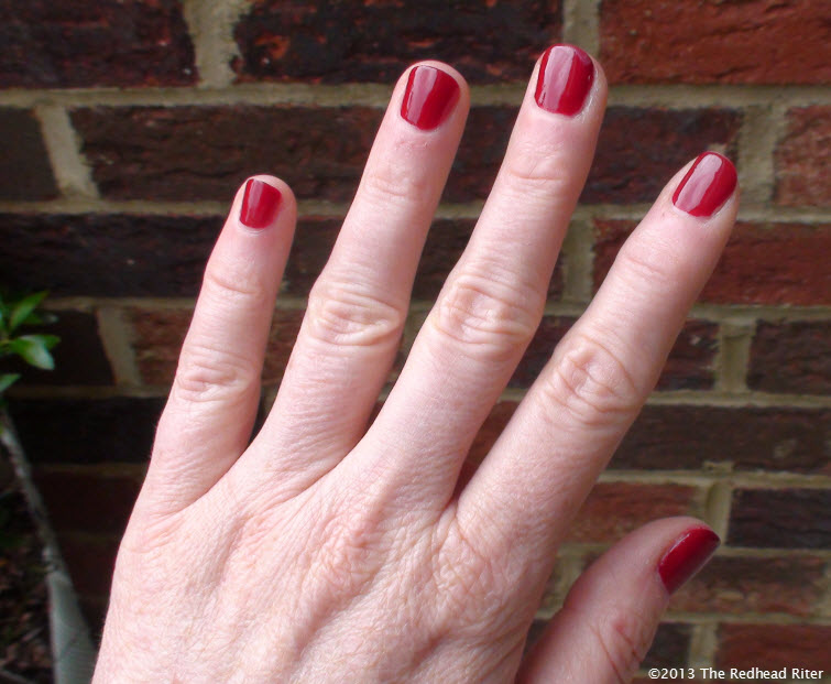 bright red painted fingernails