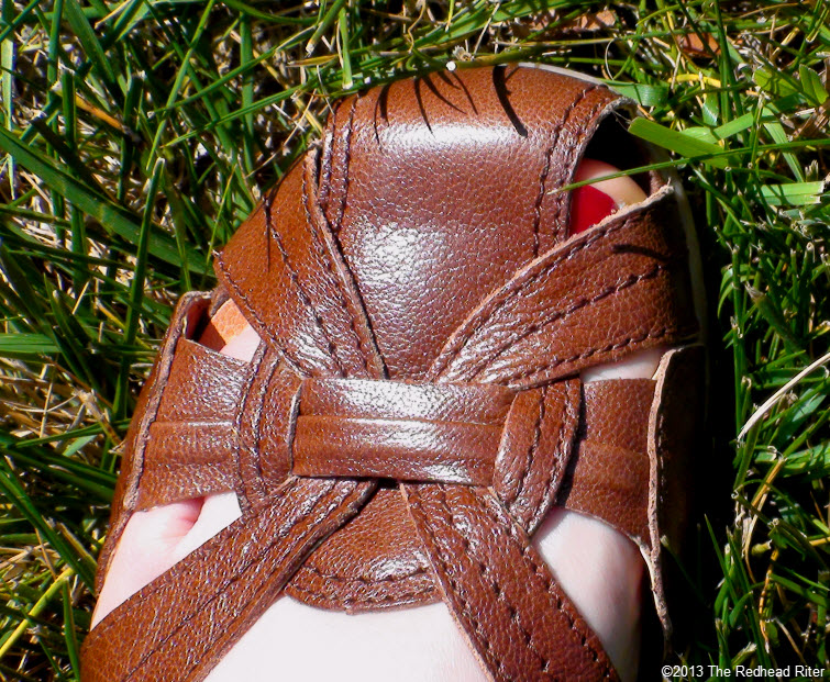 brown sandal red toenail grass