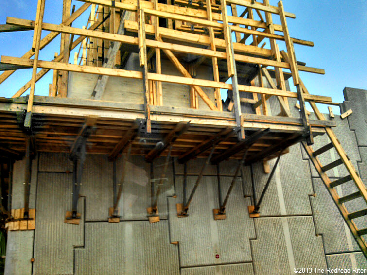 scaffolding thick concrete wall blocks