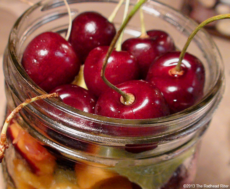 cherries fruit in mason jar