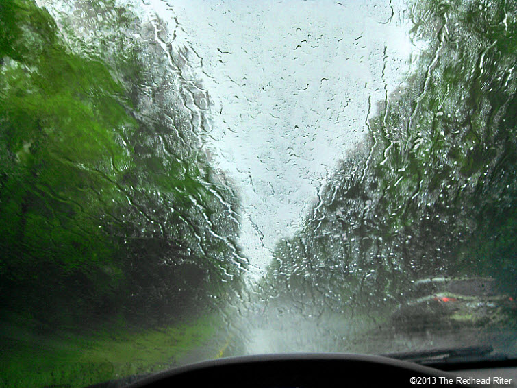 driving in rain long road