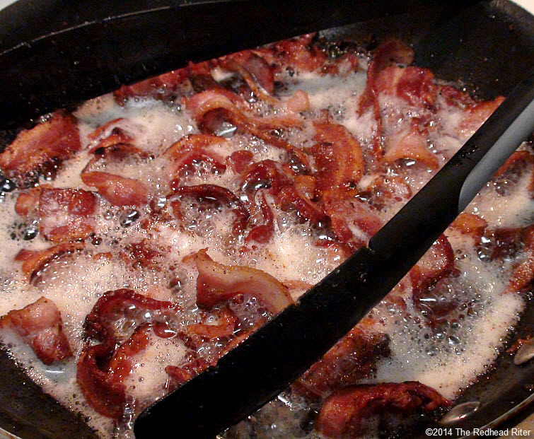 2 bacon frying and sizzling