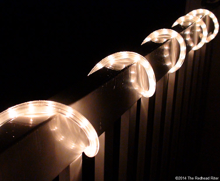 patio lights on rail at night