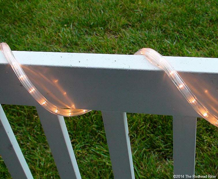 patio lights on rail during day