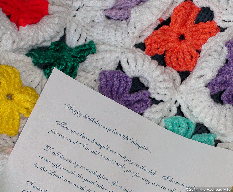 crocheted afghan multi color flowers note