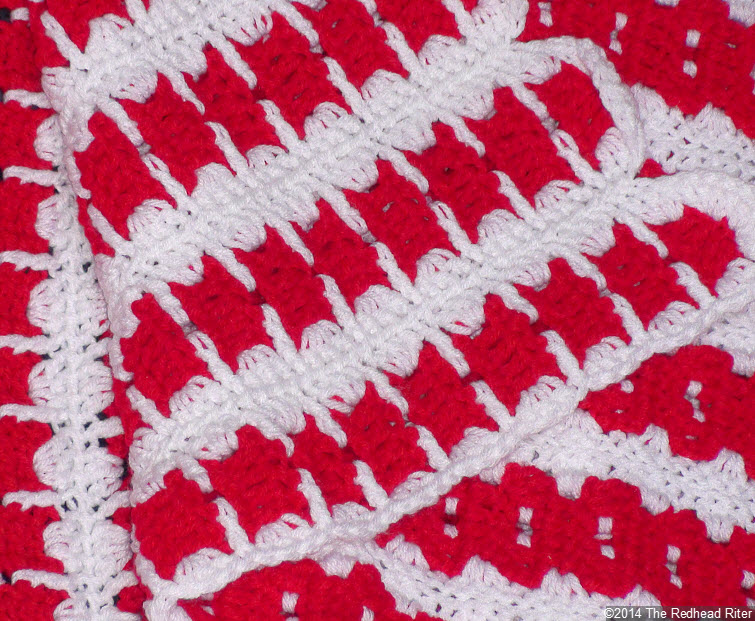 crocheted afghan red white