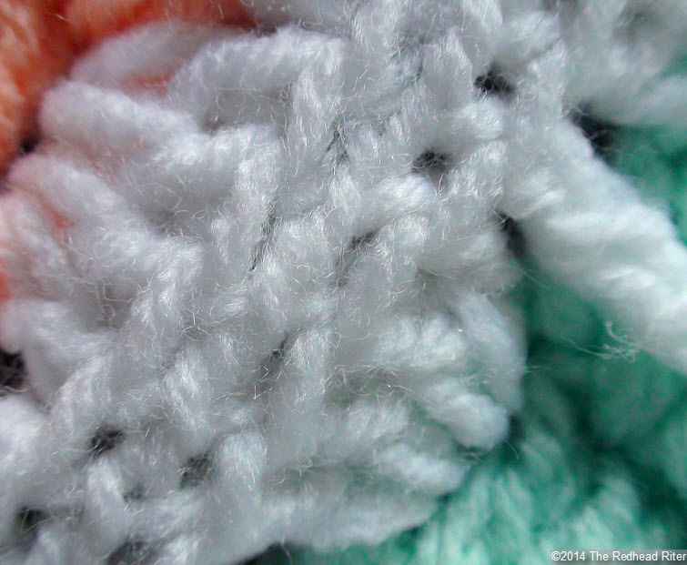crocheted afghan white stitches close up