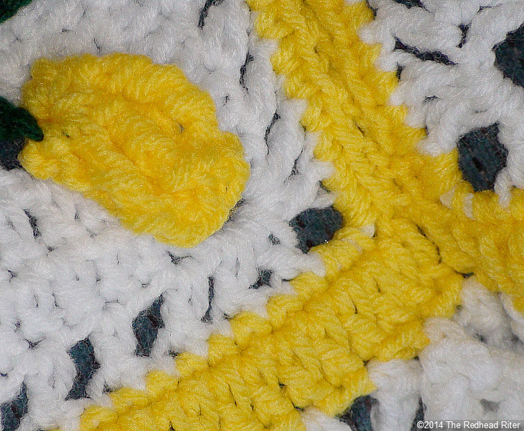 crocheted afghan yellow flower closeup connections