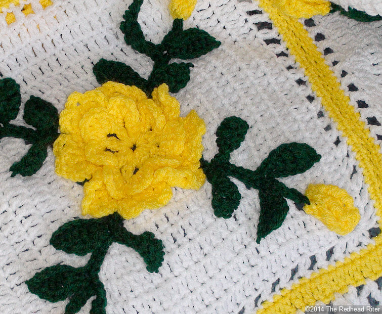 crocheted afghan yellow flowers closeup