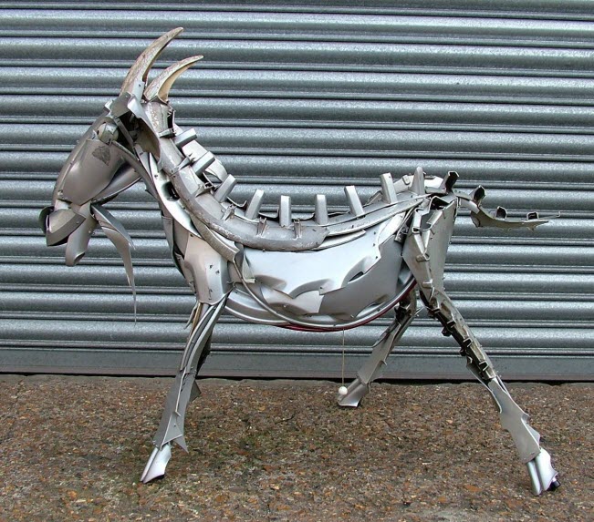 goat ping pong ball eyes Car Part Art - Old Recycled Hubcaps Into Awesome Sculptures