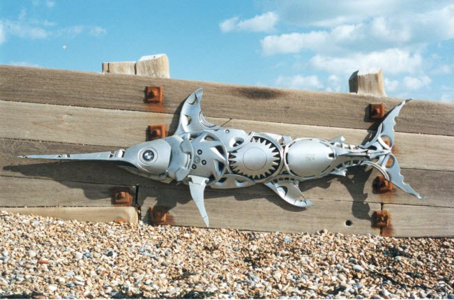 swordfish bmw eye Car Part Art - Old Recycled Hubcaps Into Awesome Sculptures